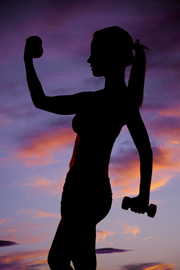 teen girl lifting weights - stock photo